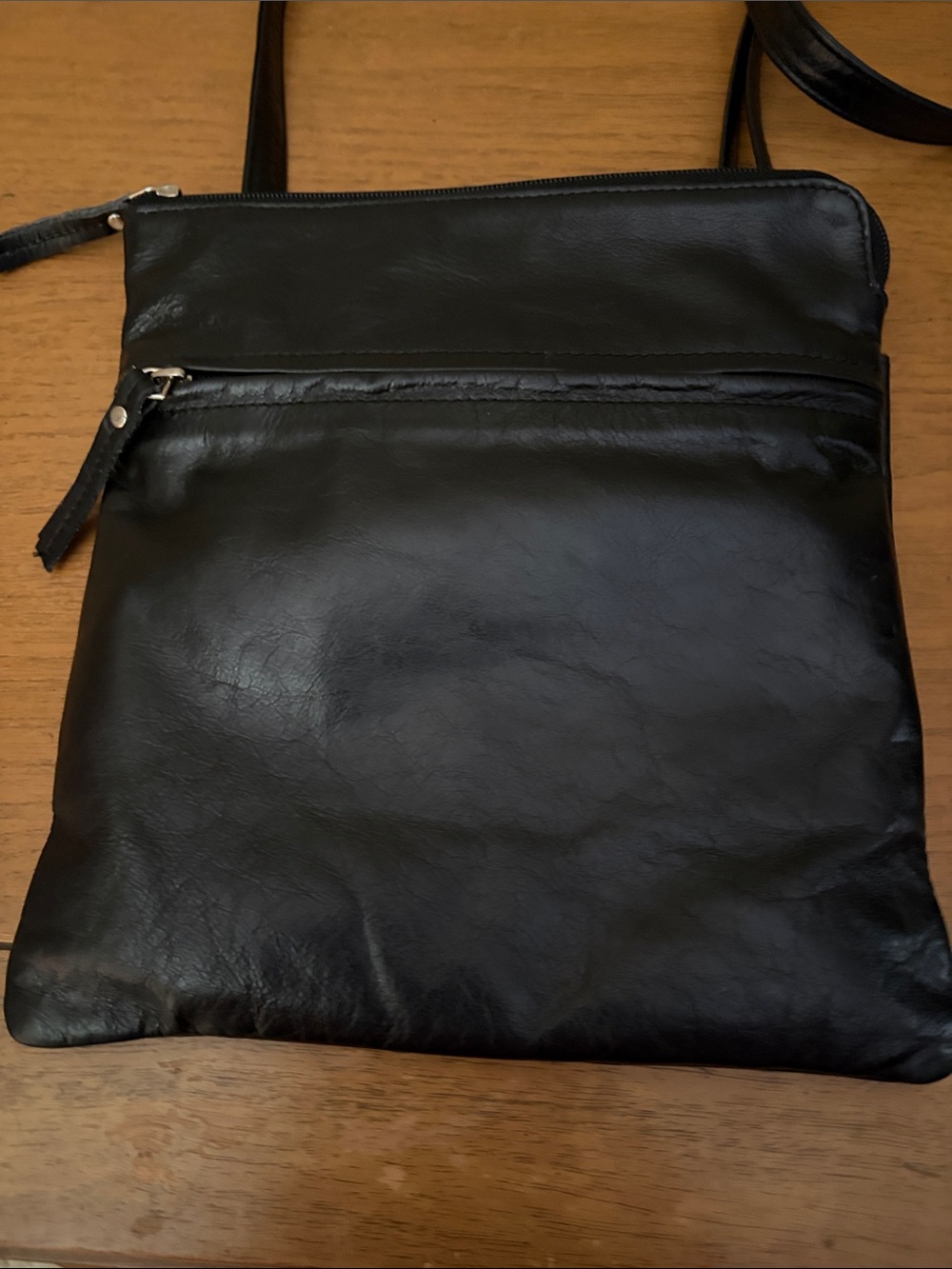 Latico black leather crossbody purse